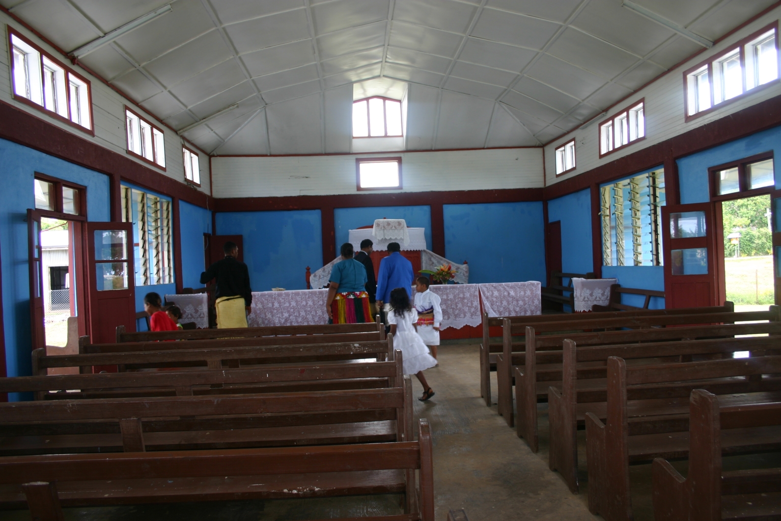 Congregation leaving Talihau Church, Tonga